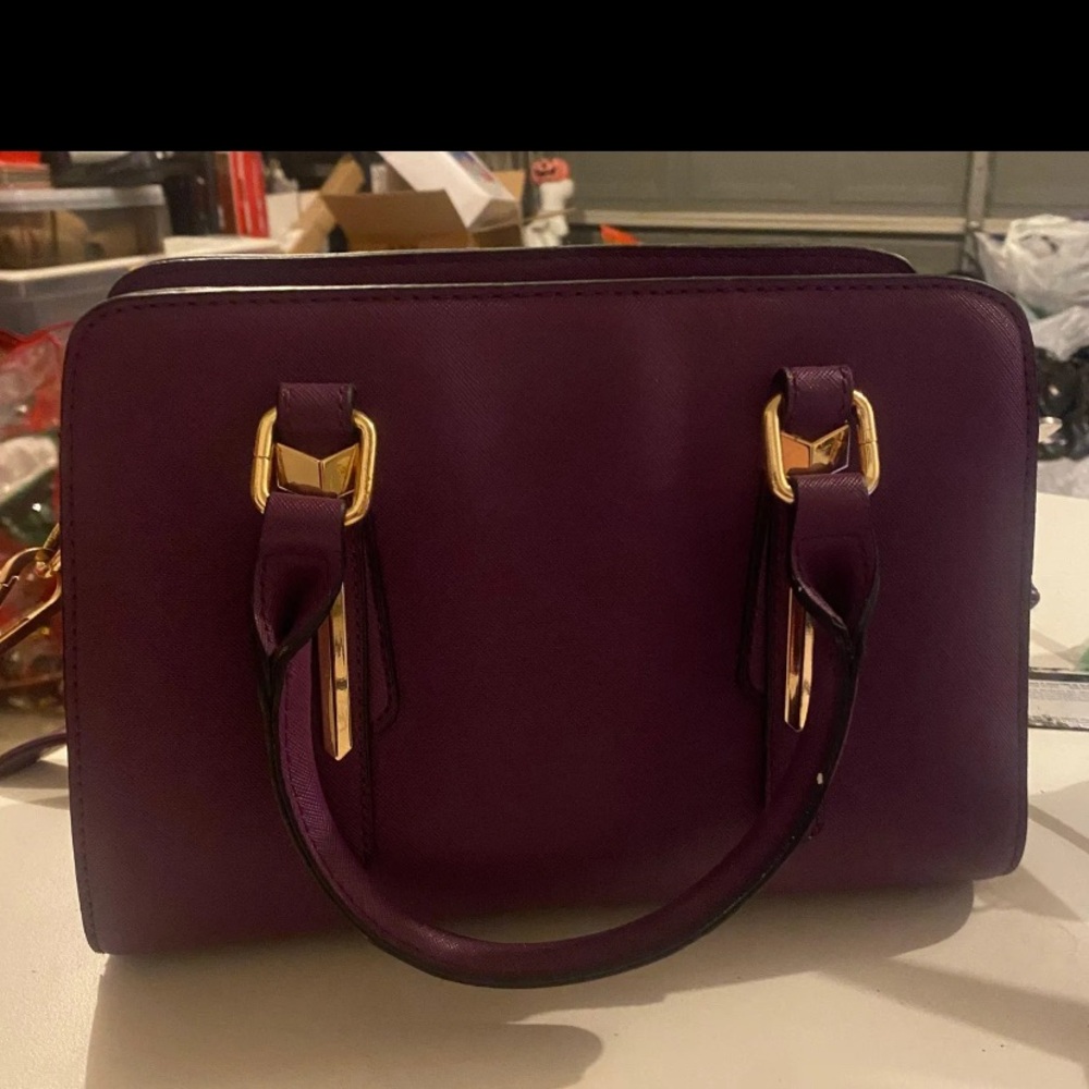 Luxurious Purple Satchel with Gold Accents